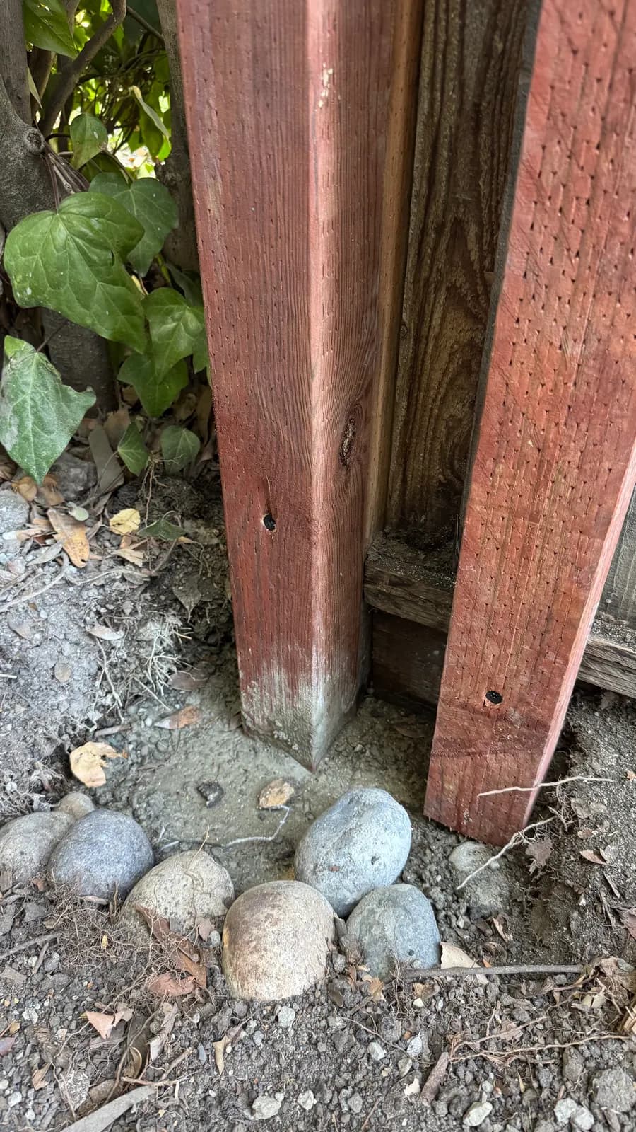 New post set in fresh concrete with a gravel collar, Palo Alto