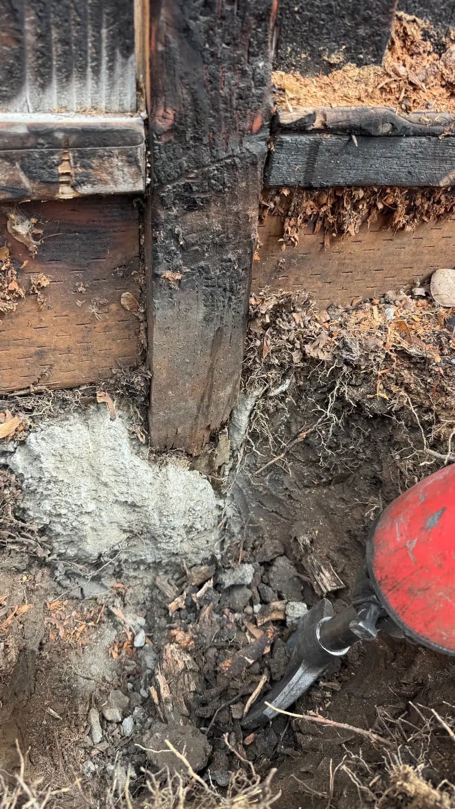Old concrete footing broken out around the failed post, Palo Alto